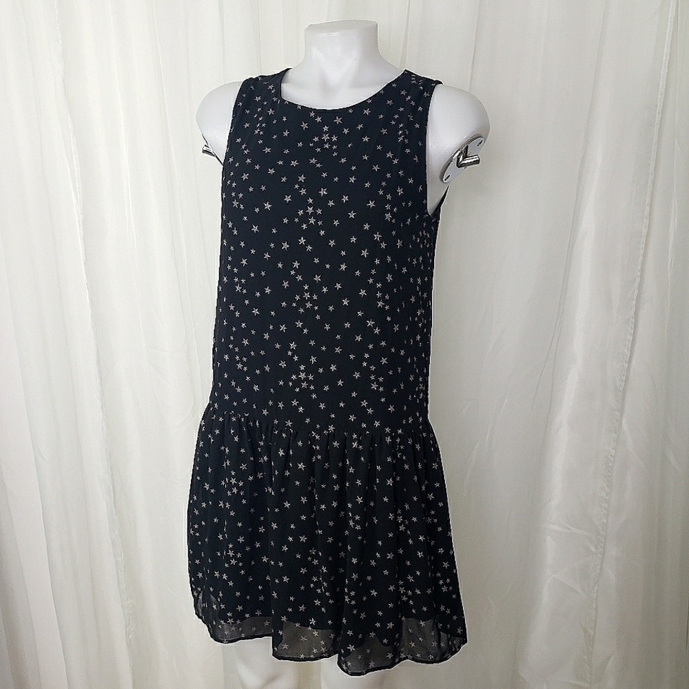 MNG Mango black and silver star pattern sleeveless dress ruffled hem high neck